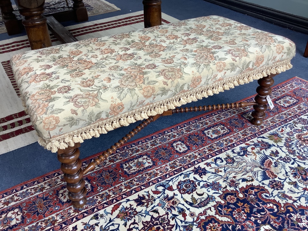 A Victorian bobbin turned walnut stool, length 116cm, depth 56cm, height 48cm